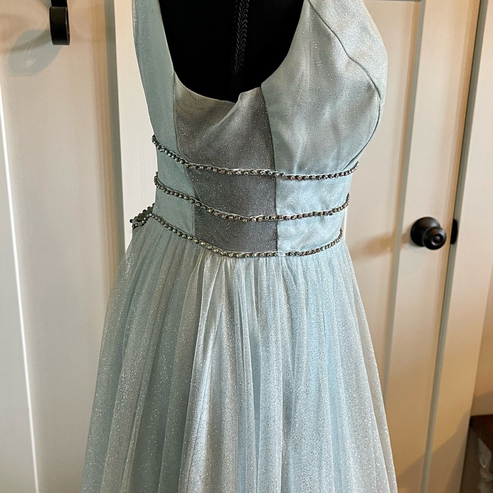Light blue formal dress size 9/10 worn one time for a hour . Tag attached